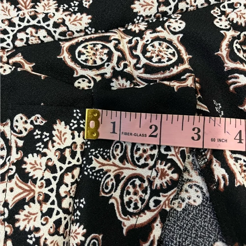Lush  romper one piece Size small fun all over print sleeveless date